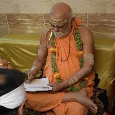 Shankaracharya reviewing scriptures